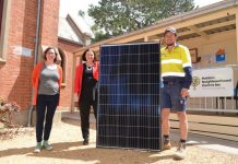 Solar boost! Maldon Neighbourhood Centre coordinator Amy Atkinson, Bendigo Federal MP Lisa Chesters and Matt Wilson of Central Spark Victoria are delighted to see the project completed.