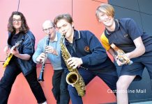 Jazz cats purring Castlemaine secondary college music students Tom, Jeremy and Finn with music teacher Ben Nieuwkerk (on clarinet) get set for the Castlemaine Jazz Festival. Photo: Eve Lamb