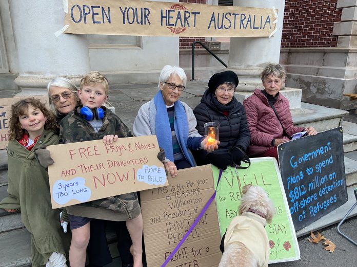 Some of the faithful Rural Australians for Refugee Castlemaine members are pictured at their weekly vigil on Wednesday evening.