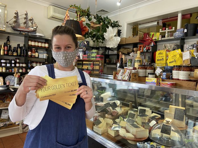 Mulberrys Delicatessen team member Kim Cash urged locals to pick up their Golden Ticket and get in the running to win a share of $5000.