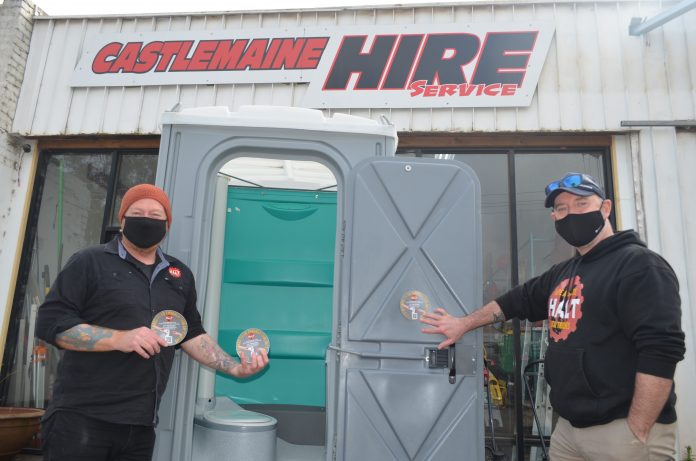 R U Okay? Feeling Sh*t? This new HALT initiative aims to help tradies across the country. HALT founder Jeremy Forbes and HALT North West region project worker Tom Kenneally are pictured with the new stickers at Castlemaine Hire Service earlier this week.