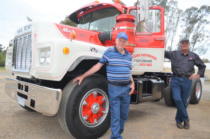 Former driver Don Finning and Ian McClure are pictured with the newly restored Mack R Model which will feature in Sunday's Truck Show.