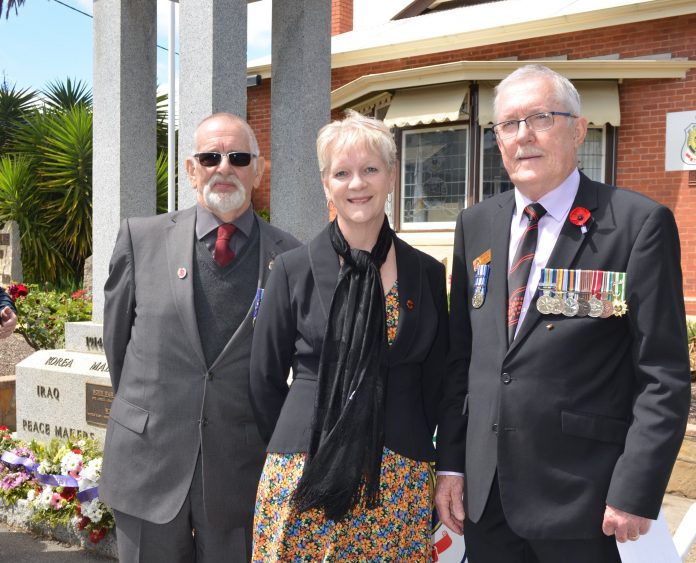 Castlemaine RSL president John Whiddon, Bendigo West MP Maree Edwards and MC Alan Lane are pictured at Thursday's Remembrance Day service.