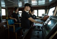 Local on the frontline of ocean conservation Action stations. Captain James Brook is pictured at the helm of the M/V Ocean Warrior. Photo: Sea Shepherd.