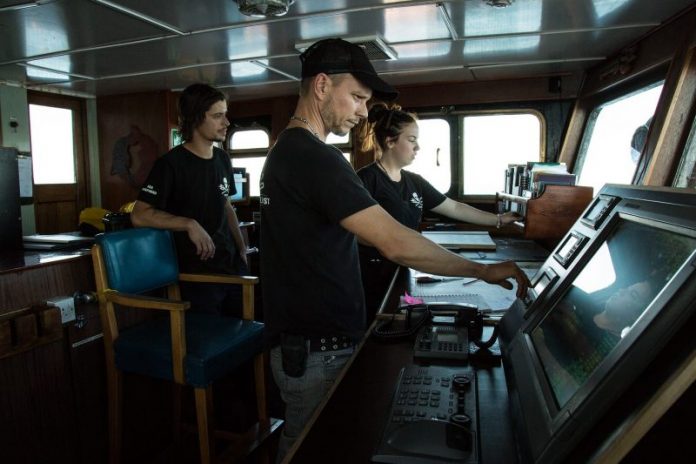 Action stations. Captain James Brook is pictured at the helm of the M/V Ocean Warrior. Photo: Sea Shepherd.