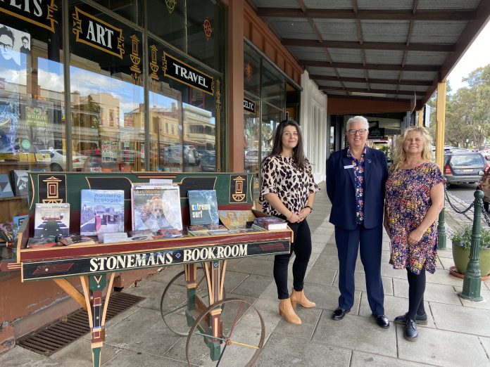 Mainstreet Australia president Georgina Pikoulas, Mount Alexander Shire Council's manager of economy and culture Merryn Tinkler and Business Mount Alexander treasurer Jacqueline Brodie-Hanns are pictured outside Castlemaine's iconic Stoneman's Bookroom.