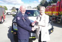 New vehicle for CFA Mount Alexander Group Officer Peter Farley proudly accepts the keys to the new Field Command Vehicle from Bendigo West MP Maree Edwards. Photo: Max Lesser.