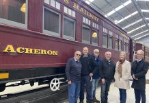 $125,000 funding boost for Victorian Goldfields Railway VGR vice president John Hoy, president Steve Strangward, board member Tony Llewelyn, restoration volunteer Tom Donaldson, Bendigo West MP Maree Edwards and Mount Alexander Shire Council CEO Darren Fuzzard are pictured with the newly restored carriage Acheron.