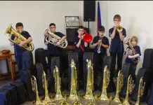 Salvation Army Castlemaine strikes up the band Some of the Just Brass participants are proudly pictured with their haul of new instruments. Photo: Max Lesser.