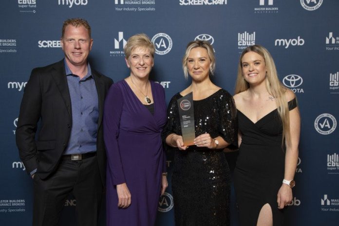 cNatAward130922-1 Edifice Construction founders and husband and wife Dugald and Ellissia Campbell and office manager Teagan Lambie proudly accept their award at the Melbourne event.