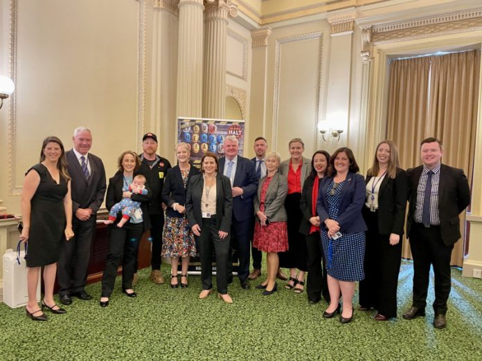 The HALT team are proudly pictured with Bendigo West MP Maree Edwards, politicians and tradies at Parliament House.