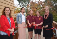 Historic Chewton school receives a makeover Bendigo West MP Maree Edwards unties the ribbon to official open the new look school with Principal Bernadette McKenna, School Council president Megan Butler and school captains Arkie and Zac.