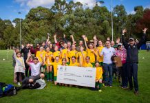 Funding boost for Castlemaine Goldfields Castlemaine Goldfields Football Club members celebrate the presentation of the cheque from the University of Melbourne research team. Photo: Miranda Russell.