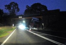 Truck hits bridge at Harcourt