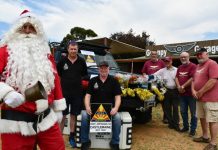 Santa Run returns! Past Apex Club of Castlemaine members Leigh Tonkin, Stephen Copper and Ash Franklin accept their generous donation from Guildford Grumpies members Alf Partridge, Ian 'Doc' Potter, Steve Cole and Mark 'Truckie' Ashby.