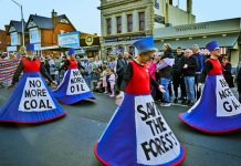 A silent spectacle Castlemaine residents Trevor Scott and Serena Everill alongside their fellow Sybil Disobedients in silent protest in Daylesford. Photo by James Healey.
