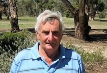 Golfers brave the wet