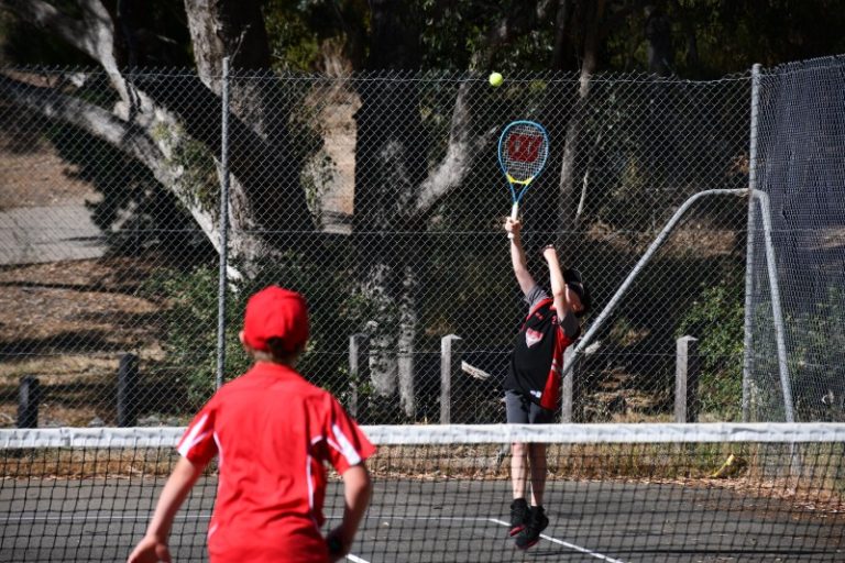 Tennis juniors give it their all