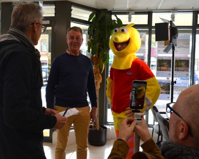 Run The Maine race director Gavin Krasner interviews longtime event sponsor Brett Fitzpatrick of Castlemaine Property Group (CPG) about their reasons for supporting the annual event as RTM mascot 'The Bird' aka Dr Richard Mayes watches on, and videographer Ben Harding of RTM partners Storyland captures the moment for the RTM socials.