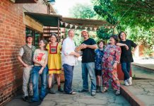 Passing the sourdough baton Left: (former owners) Ezra, Sana, Patricia, Paul. Right: (incoming owners) Marcus, Peg, Lisa and Stan (new owners). Photos by Penny Ryan.