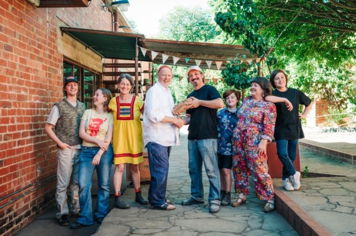 Left: (former owners) Ezra, Sana, Patricia, Paul. Right: (incoming owners) Marcus, Peg, Lisa and Stan (new owners). Photos by Penny Ryan.