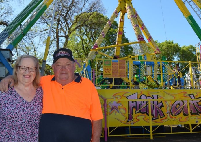 Castlemaine & District Agricultural Show Society secretary Debbie Hamilton and longtime attendee Frank 'Boy' Laurie are pictured with new ride Freak Out.