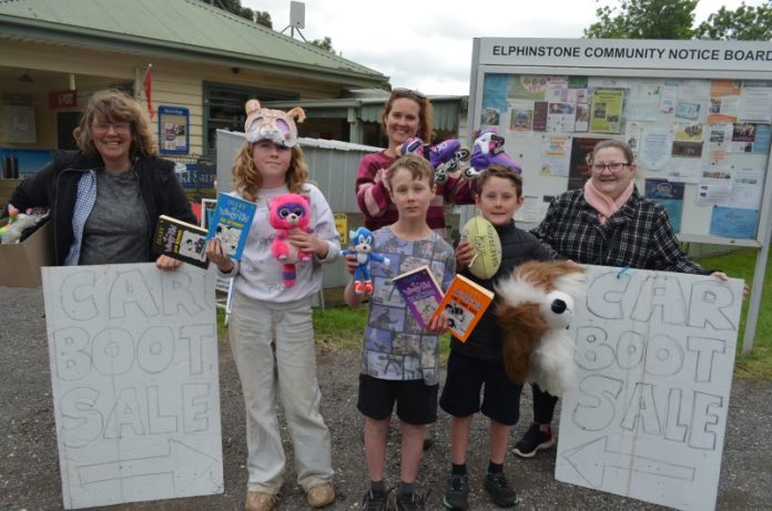 cElphoGarage241025 Elphinstone residents Sam, Romy, Susan, Gilbert, Ren and Nikki invite the wider community to attend Sunday's Elphinstone Town-Wide Garage Sale and grab a bargain.