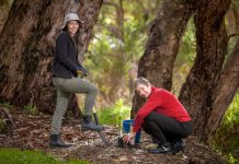 Local action the antidote to climate overwhelm Harcourt Valley Landcare Members Vanessa and Robyn 'doing their bit'. Photo: Richard Baxter.