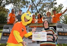 Record breaking donation for Dhelkaya Health GL Run the Maine Committee Members and The Bird, proudly giving a $50,000 cheque to Dhelkaya Health's CEO, Sue Race.