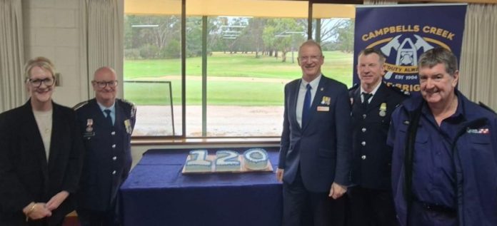 Bendigo West MP Maree Edwards, Captain Stuart Hand, CFA CEO Greg Leach, Cmdr Rick O’Callaghan, and Group Officer Shane Scoble prepare to cut the 120 year anniversary cake.