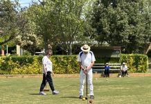 Croquet sides in fine form Steve Duffy looking for a way through to the hoop.