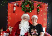 Santa visits Hot & Crusty Santa and Hot & Crusty Country Bakery's Geraldine Delmenico.