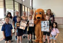 Our Newshounds celebrated! Some of our proud Newshounds award winners are pictured with DON representative Helen Shaw, mascot Elliott Newshound and Castlemaine Mail manager Lynda Brew.