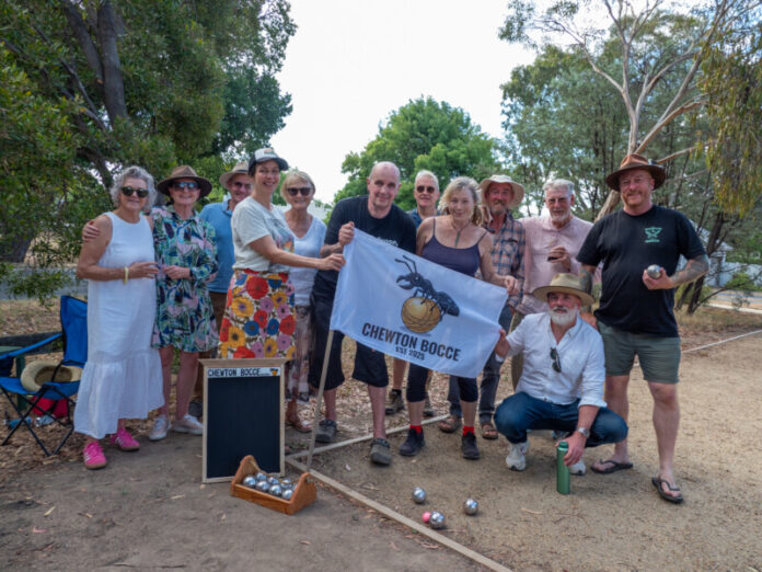 The Chewton Bocce Club are proudly pictured with their flag. Photo: John Ellis, Chewton Chat.