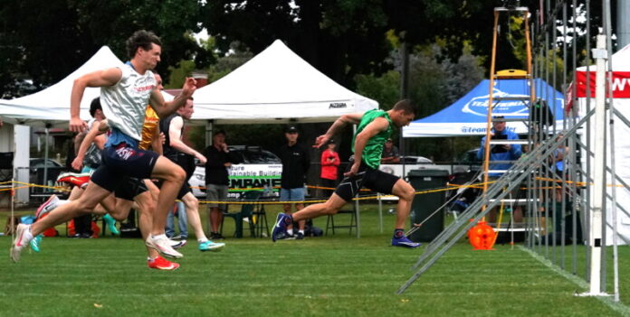 Canberra's Brendan Matthews claims the honours in the Men's 120 metre Castlemaine Gift. Photo: Jamesons Photography