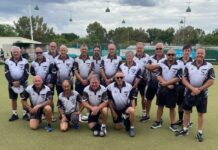 Castlemaine Bowling Club's Division 1 side celebrate their win.