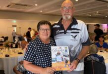 Rod Phillips is proudly pictured with his wife Sandra and his Bendigo Campaspe Goldfields Bowls Region 'Warramunda Community Care Bowler of the Year Award'.