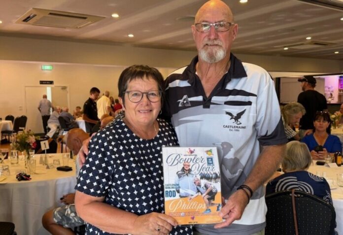 Rod Phillips is proudly pictured with his wife Sandra and his Bendigo Campaspe Goldfields Bowls Region 'Warramunda Community Care Bowler of the Year Award'.