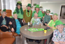 Arcare residents are pictured in their Irish flair for the St Patrick's Day event with team members Amanda and Marianne and visitor Milly.