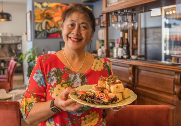 Ajcharya of Klua Sathorn Thai invites you to try 'The In-Law Tofu'. Photo: Tiffany Warner Photography.