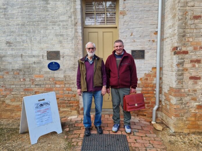 Castlemaine Historical Society Inc member John Brennan and author Russell Garbutt are pictured during his visit to Castlemaine.