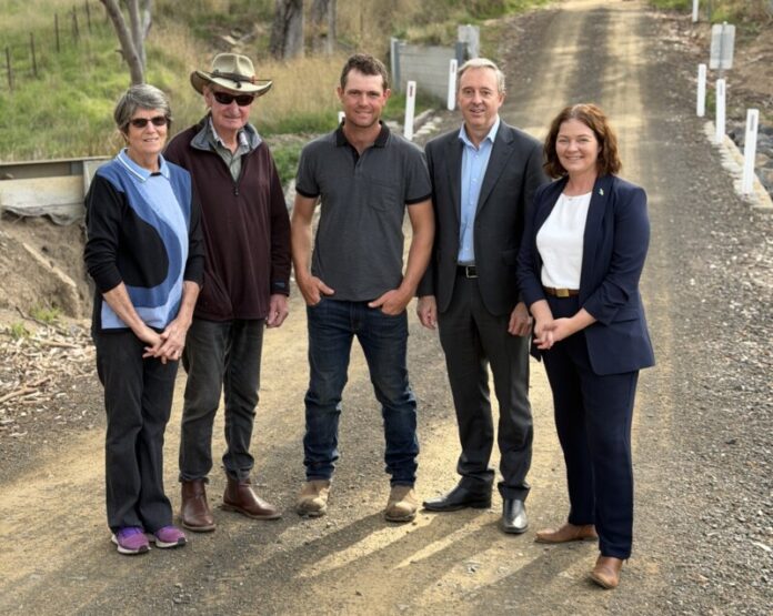 Local residents Margaret Barty, Doug Barty and Alex Lewis, MASC Director of Infrastructure Michael Annear and MP Lisa Chesters at the temporary road bridge that will be replaced.