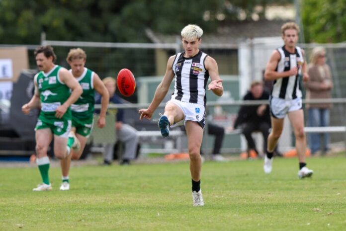 cMagpies 1 Harper Kneebone unleashes a kick against Kangaroo Flat. Photo: Peter Banko.