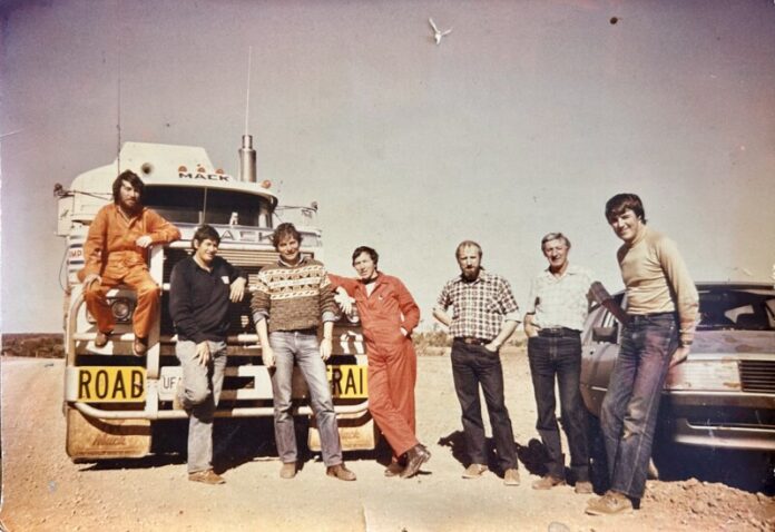 Rod on the job in 1985 (in the orange jumpsuit in the middle)