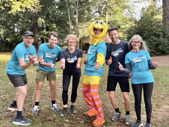 Run The Maine committee members Gavin Krasner, Luke Hooke, Di Cox, Ross Jarvis, Pat Smith and Pam Joseph model their new look 2026 t-shirts. Absent: Isobel Byrne, Richard Mayes and Steve Harris.