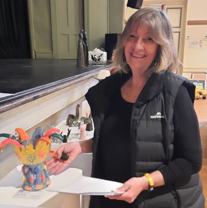 Rotary Art Show curator Catherine Tait designs the show.