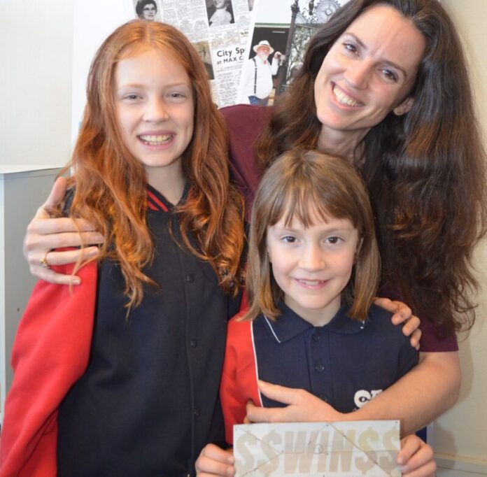 Sierra, Tess and Amelie Egan are pictured with their lucky ticket!