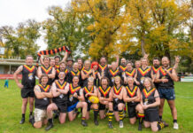 MAIN Game kicks goals! The Rockatoos were thrilled to claim the trophy for the second consecutive year. Photo: Diana Domonkos