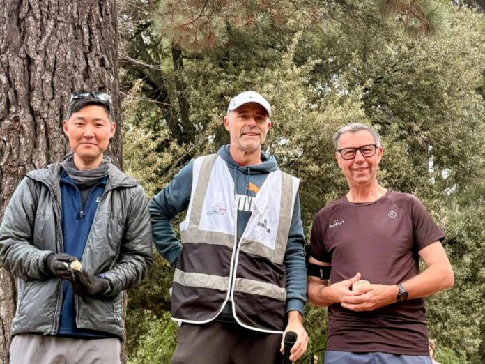 After receiving his 25 volunteer stone last week, Ross presented Daisung and Neil with their respective mile 'stones'.