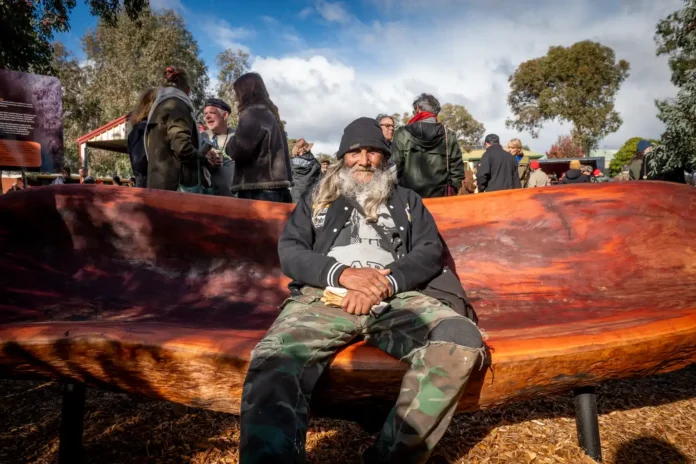 Dja Dja Wurrung Elder Uncle Rick oversaw the making of the Reconcilation Seat made by artisan Pete McCurley. Photo: Diana Domonkos